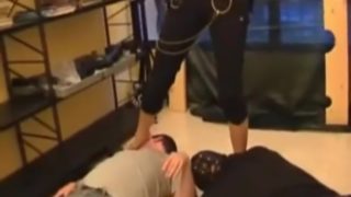 Blonde ballbusting two slaves