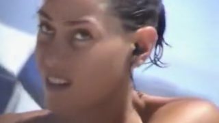 Debora Bello topless at the beach