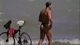 fellows in strap on the beach