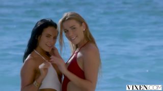Gorgeous girls are having a ffm threesome on the beach, in the middle of a beautiful day