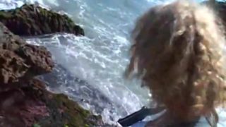 Interracial lesbian fuck on the beach