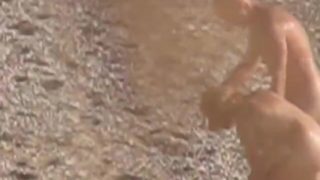 SPY HIDDEN ON THE BEACH