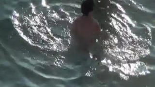 Voyeur caught lustful couple fucking on beach