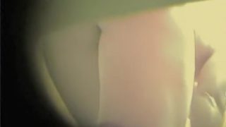 Amateur female leaning towards the spy camera in change room