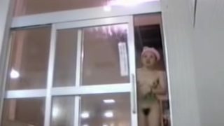 Asian hottie in the changing room puts on white lingerie