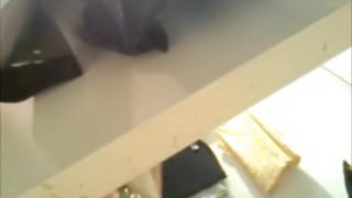 Babe tries out various clothes on a hidden camera