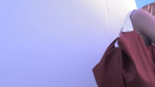 Cute teen bimbo is changing in dressing room showing tits