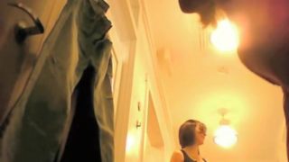 Dark-haired girl in white panties in the dressing room