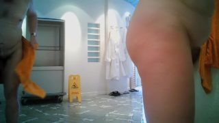Girls in changing room are in bath robes and also naked