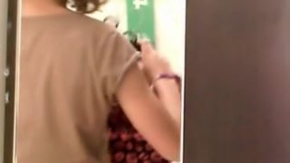 Girls tries out different bras on a hidden camera