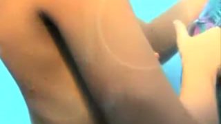 Naked pussies recorded on a spy cam in the beach cabin