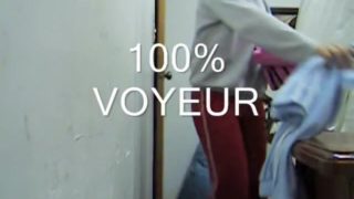 Sexy butted girl cannot decide what pants to put on
